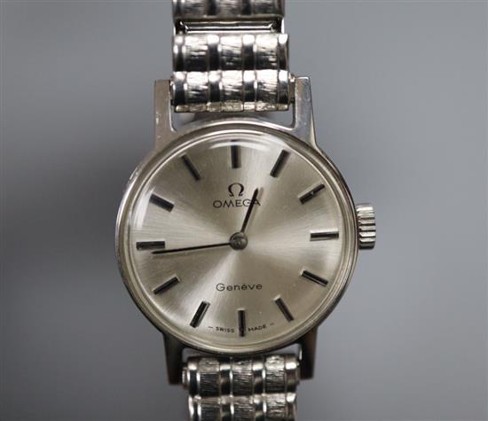 A ladys stainless steel Omega manual wind wrist watch, on associated flexible strap,
